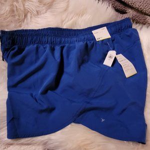 Mid-Rise StretchTech Dolphin-Hem Run Shorts for Women